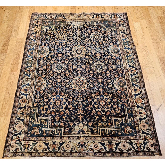 "This charming vintage Persian Malayer area rug, handwoven in the early 20th century (circa 1900–1925), features a rare...