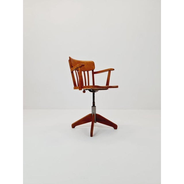 Bauhaus swivel office Armchair in solid wood By stollgiroflex 1930s The chair is in good condition Measurements: Height :...
