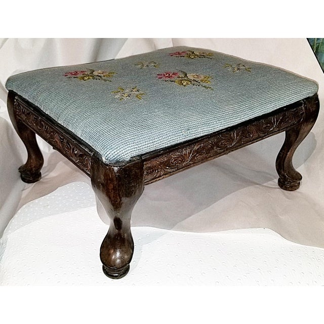 Surprisingly handy 19c Victorian footstool with handmade wool needlepoint upholstering. Queen Anne legs and slipper feet...