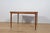 Rectangular extending dining table manufactured by the British furniture maker McIntosh in the 1960s, representing an...