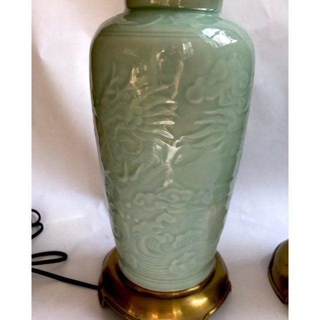 Gorgeous textured Celadon Chinoiserie Lamps made around the turn of this century by Wildwood. Beautiful and solid brass...