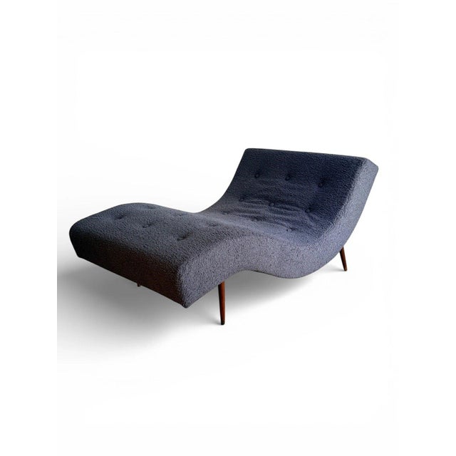 This iconic mid century modern wave chaise lounge chair designed by Adrian Pearsall is a true sculptural statement piece....