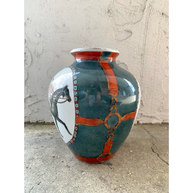 Highly collectable WBI (World Banking Institute) Chinese hand painted porcelain vase. Equestrian/Polo themed with jockey's...