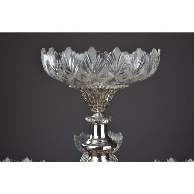 A fine quality late 19th-early 20th century silver plate centrepiece with central column and three foliate arms with leaf...