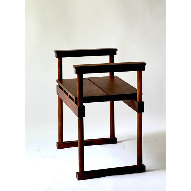 Tom Shiner's versatile walnut bench with arms is a showstopper. The rich beauty of the mahogany is used to full advantage...