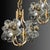 High-quality brass chandelier with four solid, floral-shaped glass shades. Manufactured by Simon & Schelle, Germany,...
