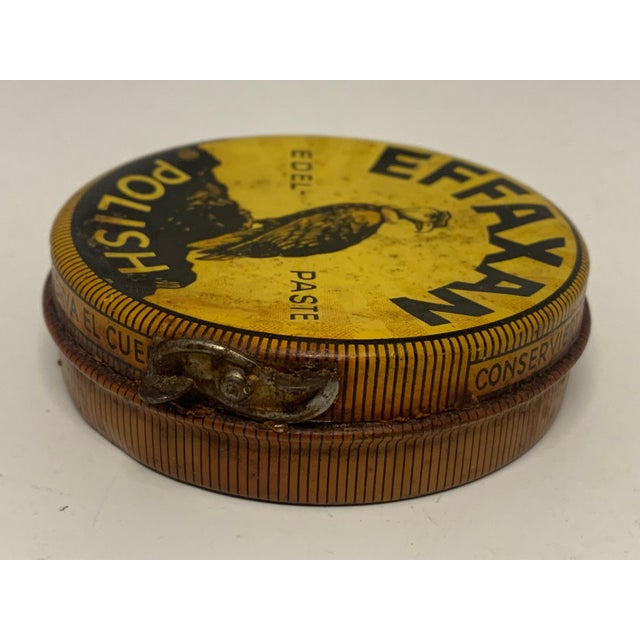 Rare Effaxan Shoe Polish Tin for your consideration. The tin measures approx. 3 inches in diameter and approx. 7/8 of an...