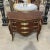 A classic touch for your home. This commode has checkered details. It has 3 drawers decorated with gold handles. Has a...