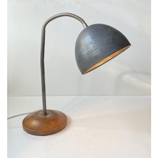 This old 1950s workbench reflector has been in use for decades in an industrial environment. It can be adjusted in any...