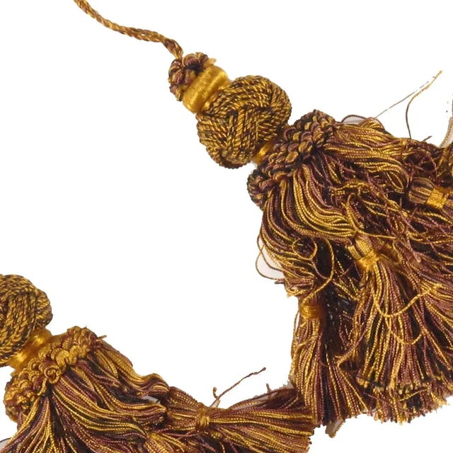 A pair of vintage double tassel tie-backs in hand-tied magenta, yellow gold / Brwon and viridian silk threads. Purchased...