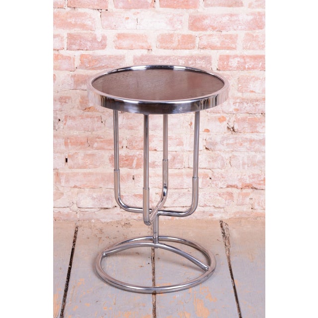 This side table is a pure representative of Czechoslovak functionalism and the Bauhaus aesthetic from the 1930s. During...