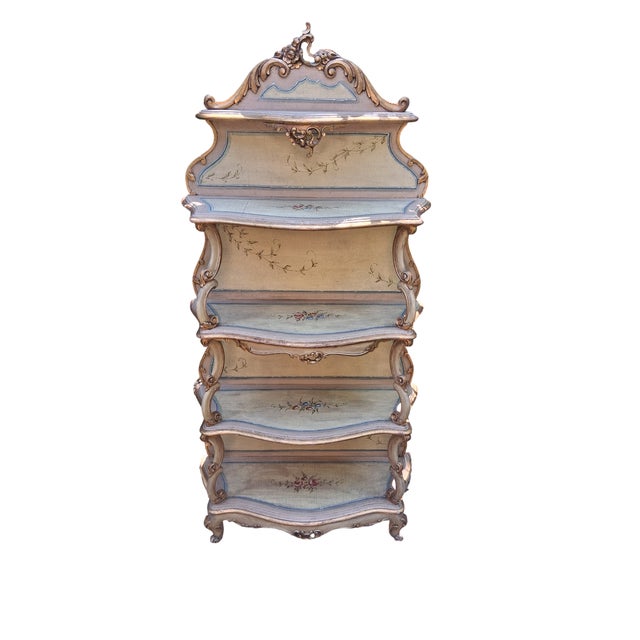 A Rococo-style freestanding shelf, tapering upwards, made in Italy around the 1950s. The colors range from delicate green...