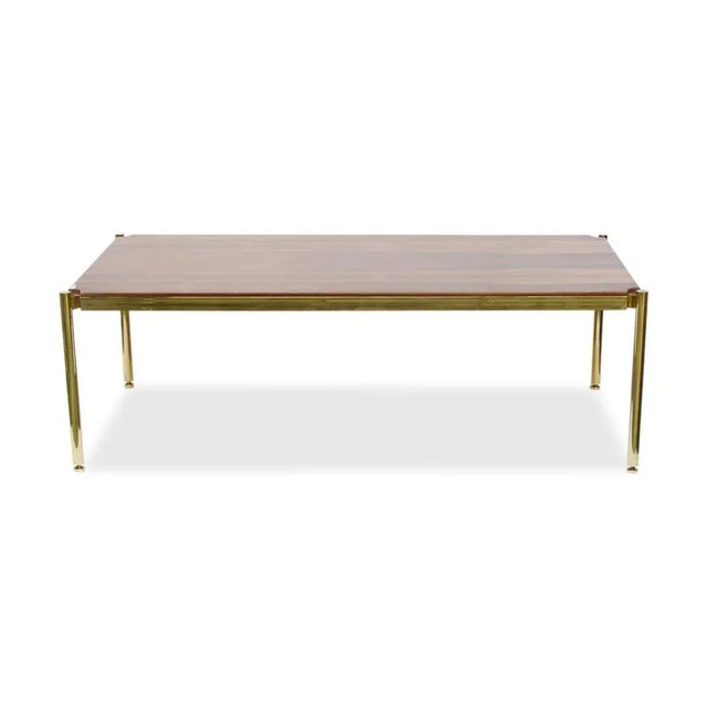 A rosewood low rectangular coffee table on polished brass structure designed by Osvaldo Borsani for Tecno. Italy 1960s...