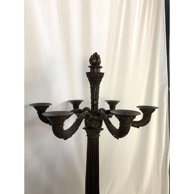 A large pair of bronze empire candelabras. H 39 in. X w 18.5 in. X d 18.5 in. H 99.06 cm x w 46.99 cm x d 46.99 cm