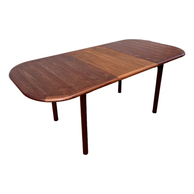 Danish Mid Century Extendable Dining Table With Stowaway Butterfly Leaf | Made in Denmark For Sale