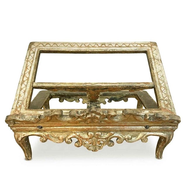 A carved and gilded wooden tabletop lectern from Italy, Venetian manufacture, dating back to the 1700s. This late Baroque...