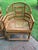Beautiful pair of mid-century Brighton pavilion bamboo arm chairs with cane seats by Thomasville. Chairs are in a natural...