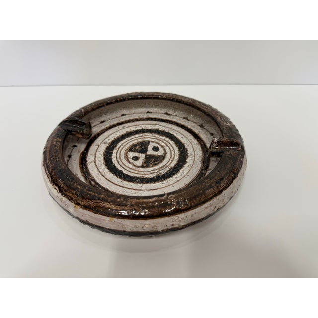 Iconic Mid-Century Modern studio ceramic was designed by Aldo Londi for Bitossi in the 1950s. Featuring a richly textured...