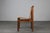 Set of twelve dining chairs with wooden frame, seat and back in leather designed by Ilmari Tapiovaara and produced by La...