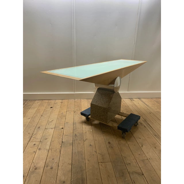 Maidda console table by Brueton. The table has an inset 1/4" sandblasted glass covering with built-in indirect lighting....