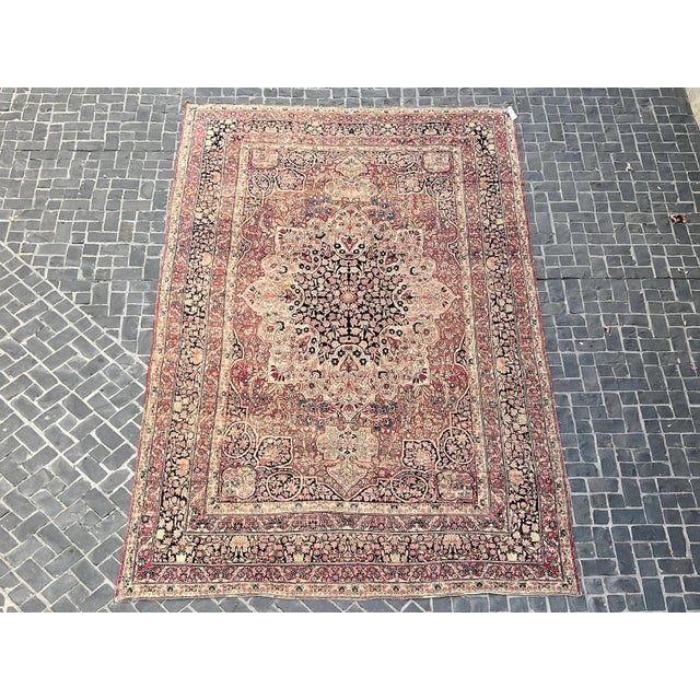 Elegant antique Lavar rug, finely woven.