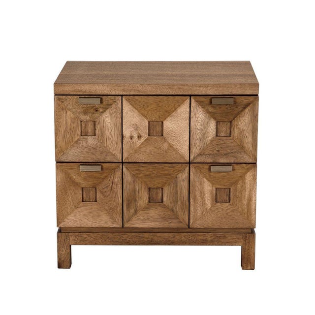 This two-drawer cabinet in Dark Walnut features six faceted, pyramidal drawer fronts that add sculptural depth and...