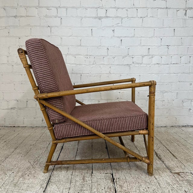 Mid Century Modern Bamboo Lounge Chair. This chair features an eye catching MCM lounge arm chair design. The base is made...