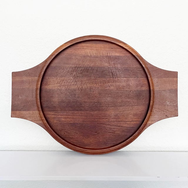 Large mid century Danish teak tray by Jens Quistgaard, the Danish designer who collaborated with Dansk Designs in the...