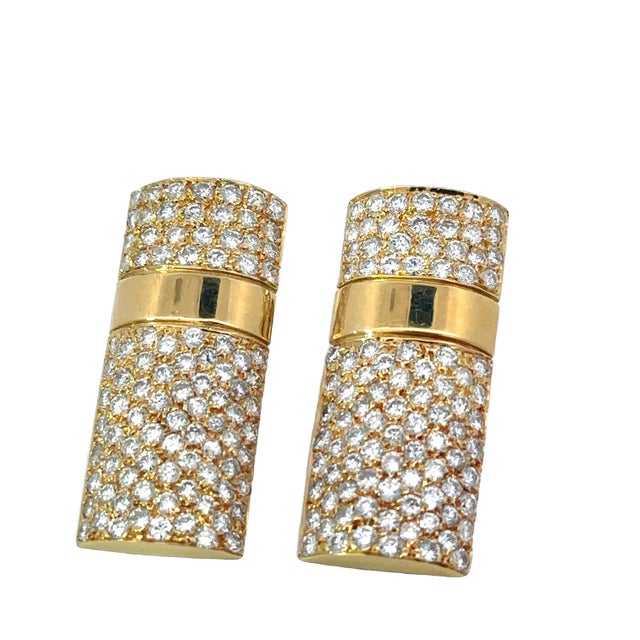 A Stunning Pair of HS Vintage Pave Diamond Earrings 4.52 Total Carats. • High Polish 18K Yellow Gold Pave set with ninety-...