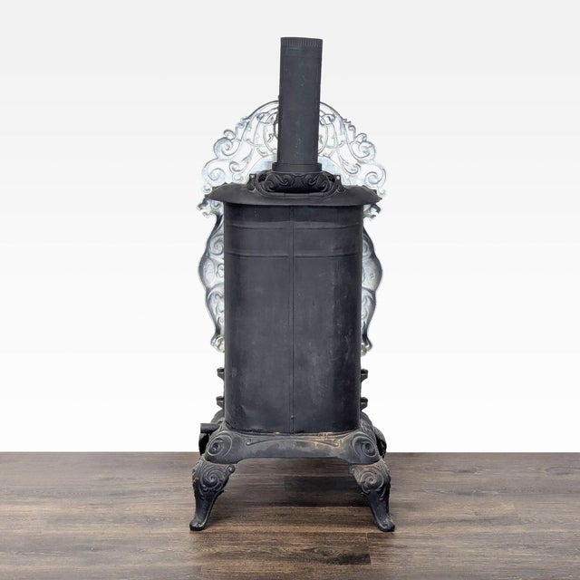 Early 20th Century Vintage Iron Parlor Stove With Ornate Details For Sale - Image 5 of 10