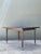 This masterful extendable dining table by the legendary Tommi Parzinger epitomizes the "New York Modern" glamour of the...