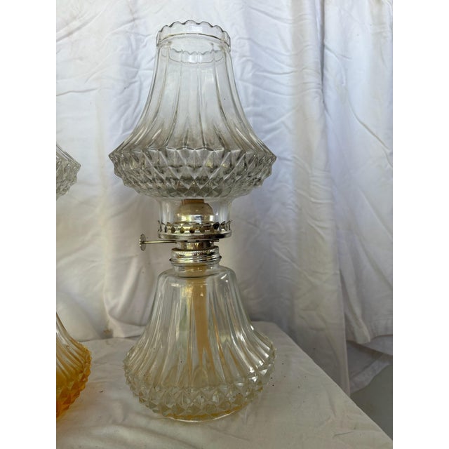 Set of two beautiful diamond cut vintage oil lanterns reminiscent of the Victorian era.