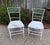 Absolutely lovely pair of vintage wrought iron faux bamboo side chairs in a classic chiavari style. Petite in size, large...