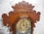 1890's Ansonia gingerbread mantel clock from the Eastlake period. Also known as an eight day kitchen clock. Classic...