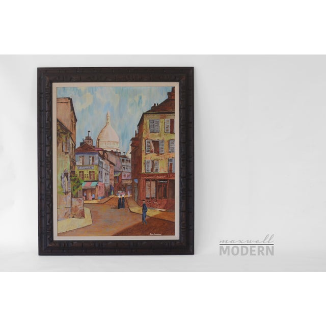 Impossibly charming vintage painting by Doris Dearhart depicting a quaint and picturesque street scene of Montmartre with...