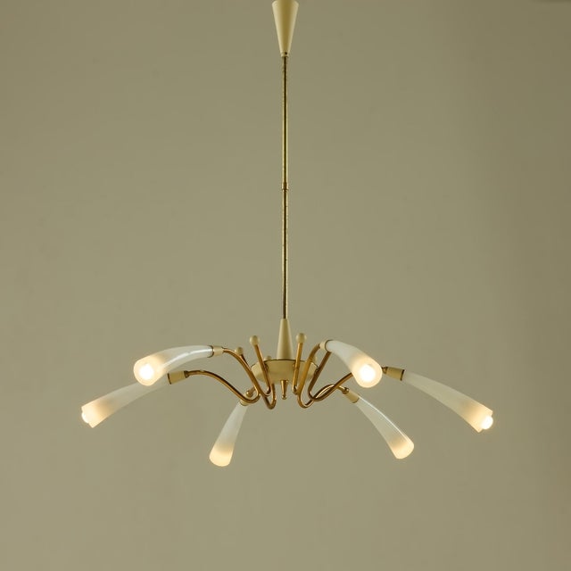 Elegant Italian mid-century spider chandelier from the 1950s or early 1960s showcasing the refined balance of form and...
