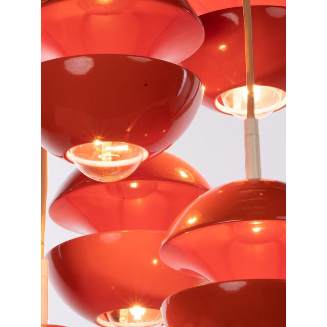 Elegant orange-red space age tulip pendant lamp designed by klaus hempel. Manufactured by kaiser lighting, germany in the...