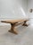 A very large wooden table with a superb patina, dating from the 1950s and reminiscent of a monastery table. The beauty of...