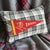 Cabin Idaho Ski Vintage Pennant on New Woven Plaid Throw Pillow For Sale - Image 3 of 4