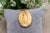 19.2k Gold Our Lady of the Immaculate Conception Pendant, in Worn conditions. Designed 1920 to 1949