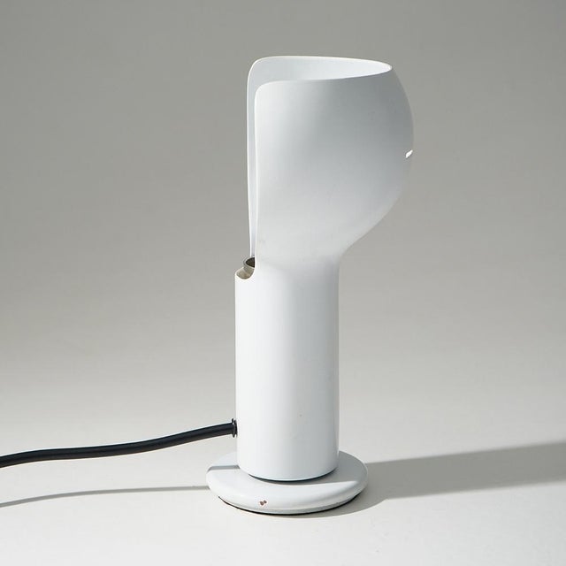 Designed by joe colombo for oluce in the 1960s, the flash table lamp stands as one of the most recognizable expressions of...