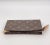 This vintage Louis Vuitton Monogram Pochette ( Pouch ) Secret (Model M41418) is crafted in classic brown coated canvas...