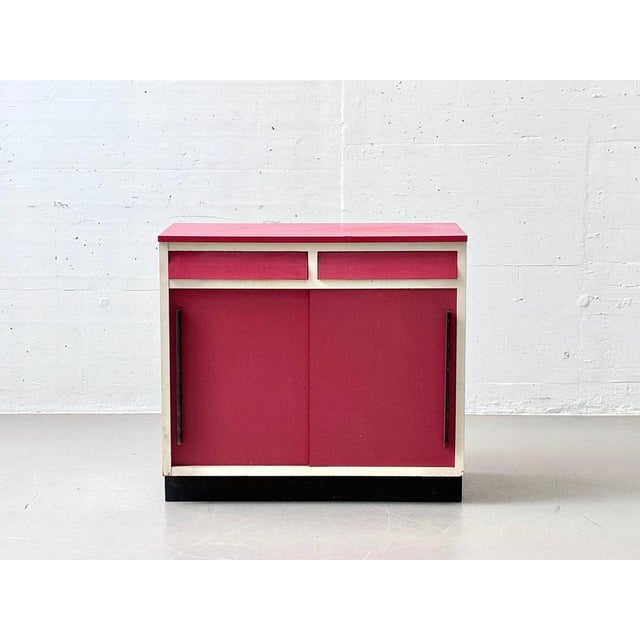 A striking sideboard from the swiss manufacturer kelko, dating from the 1980s. The characteristic combination of vibrant...
