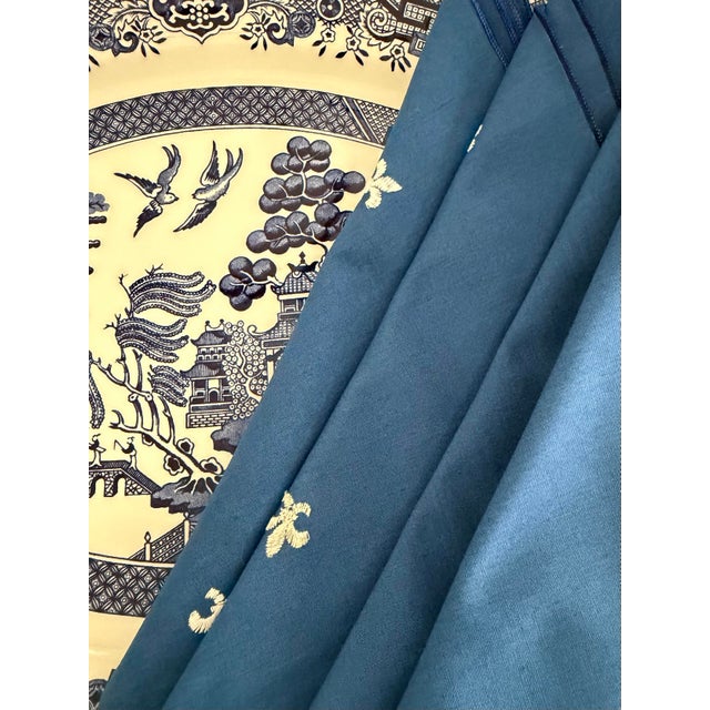 Beautiful set of eight vintage napkins feature a classic royal blue color, perfect for adding a touch of sophistication to...