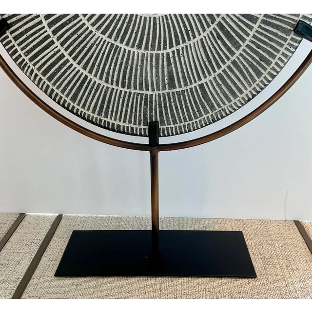 Stylish Organic Modern Gray Stone Radial Sculpture, black metal stand, showroom floor sample