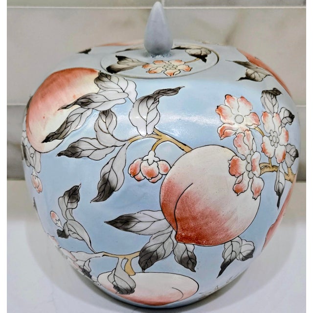 Bring timeless Chinoiserie charm to your space with this vintage powder blue porcelain melon ginger jar, beautifully hand-...