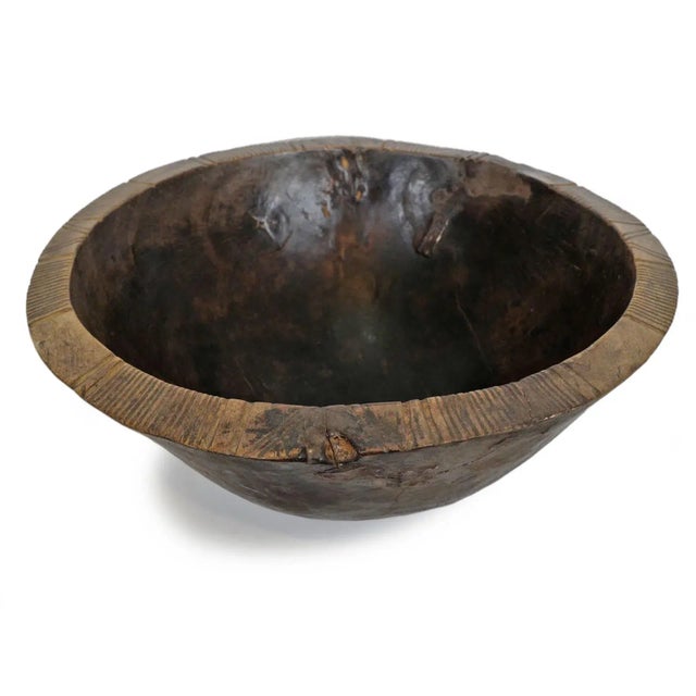 Beautiful old Tuareg wood bowl. The Tuareg people are nomadic pastoralists who inhabit the Saharan region of Northern...