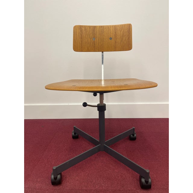 Mid-century office chair designed and manufactured by Danish Modern Designer Jorgen Rasmussen in Denmark circa 1970. Seat...