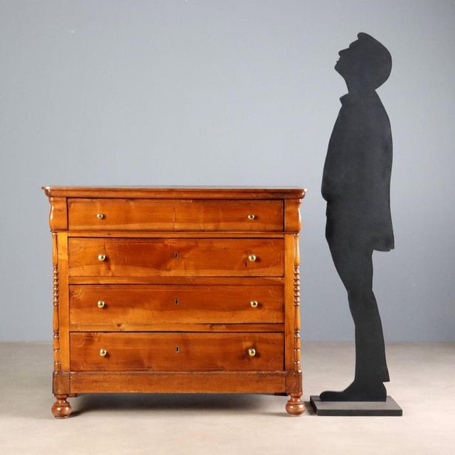 Louis Philippe walnut chest of drawers, crafted in Italy in the second quarter of the 19th century. The front features...