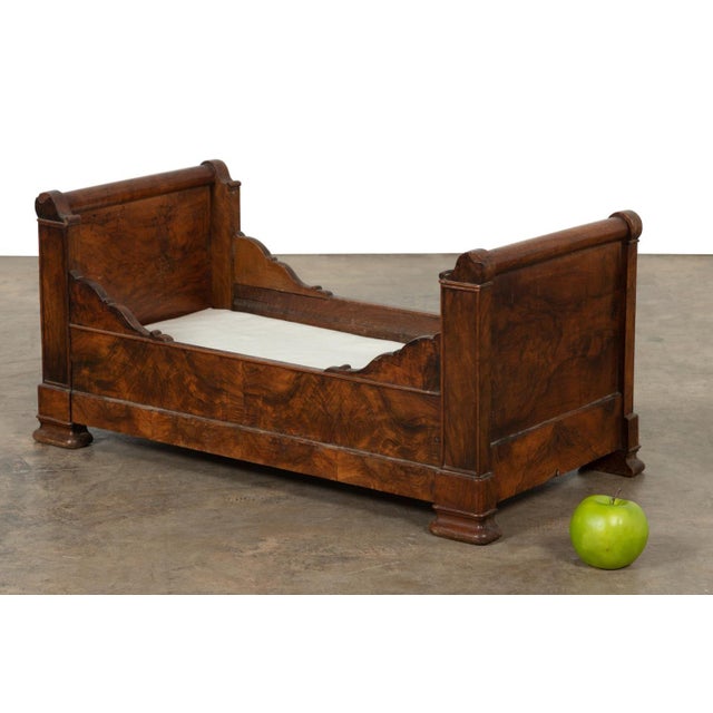 French Louis Philippe Sleigh Bed. Walnut veneered lit bateau doll's or salesman's sample sleigh daybed. Circa 19th...